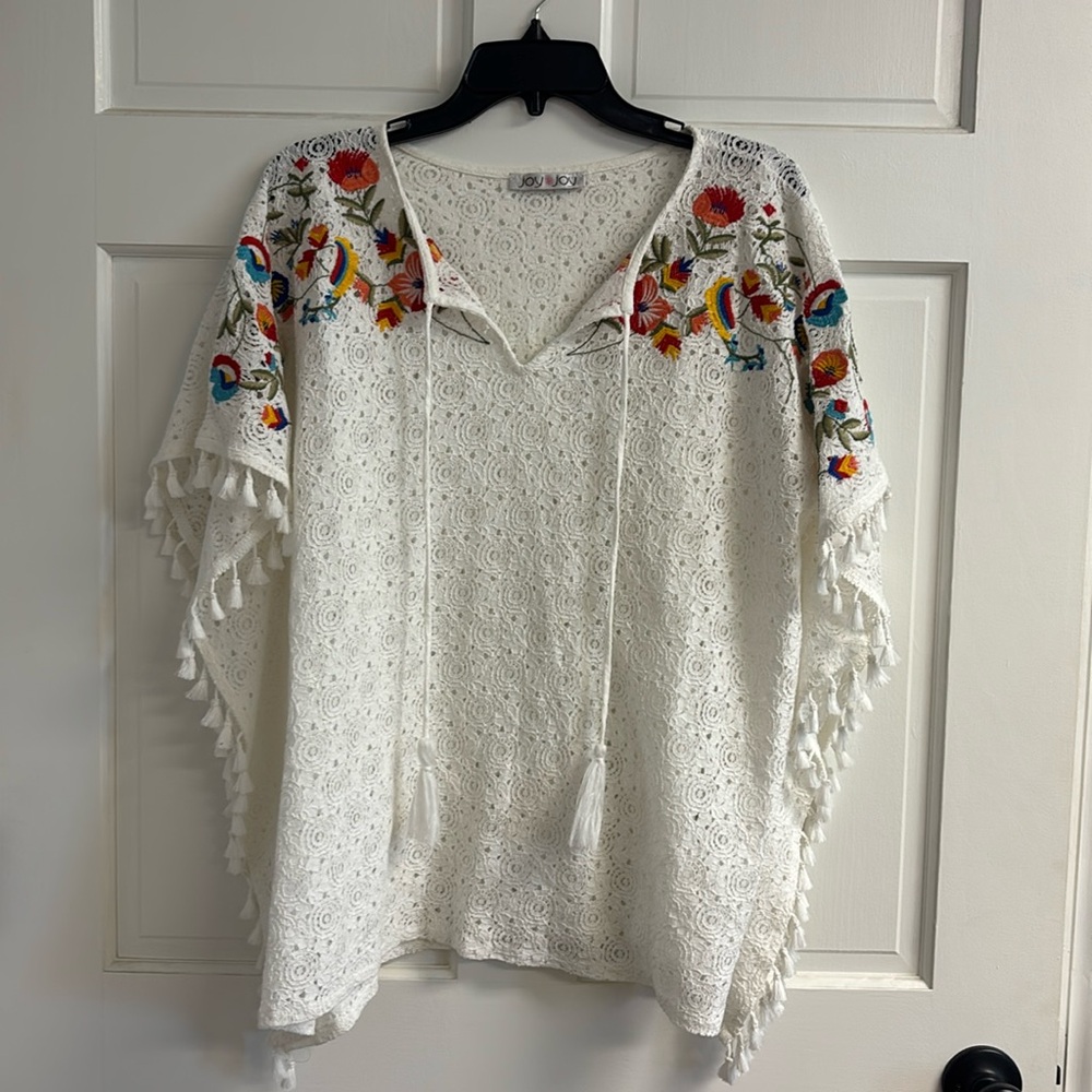 Joy Joy lace poncho with embroidered flowers